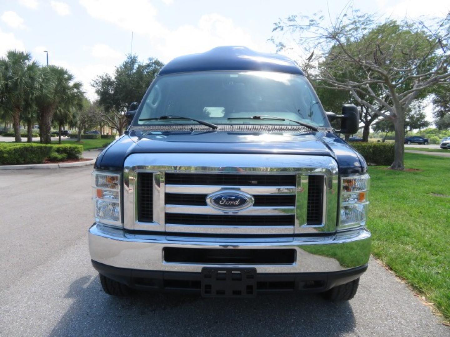 2011 Dark Blue /Gray Ford E-Series Wagon E-350 XLT Super Duty (1FBNE3BS4BD) with an 6.8L V10 SOHC 20V engine, located at 4301 Oak Circle #19, Boca Raton, FL, 33431, (954) 561-2499, 26.388861, -80.084038 - You are looking at a Gorgeous 2011 Ford Econoline E350 XLT Norcal Max High Top Handicap Wheelchair Conversion Van with 6.8L V10, 15K Original Miles, 9 Inch Lowered Floor, Braun UVL Side Entry Wheelchair Lift, Remote Control Power Side Entry Doors, Expanded Side Entry Doors, Q Straint Tie Down, Syste - Photo#9